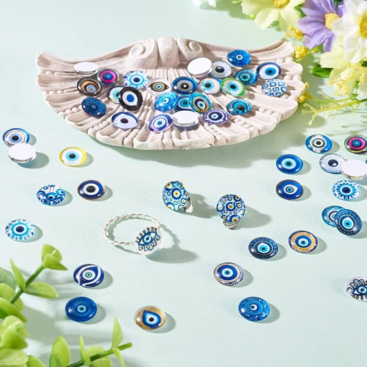 Craftora 100Pcs Evil Eye Glass Cabochons for Jewelry Making, 12x4mm Blue Eyes Half Round Cameo Dome Tiles Flatback Dome Cabochons for DIY Bracelets Necklace Scrapbooking DIY Crafts